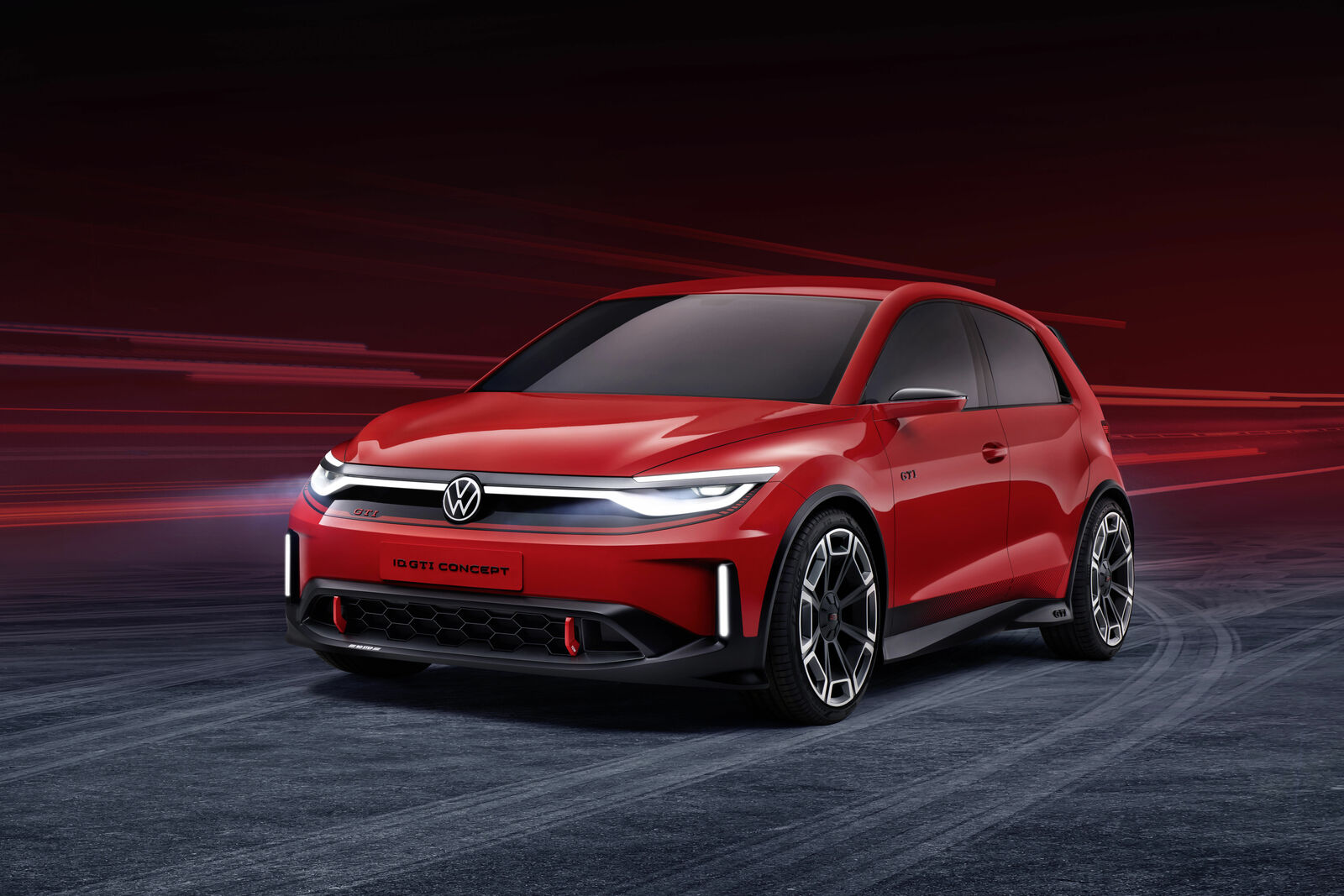 Image d'un concept car Volkswagen Golf électrique, avec des phares LED distinctifs et une carrosserie aérodynamique.