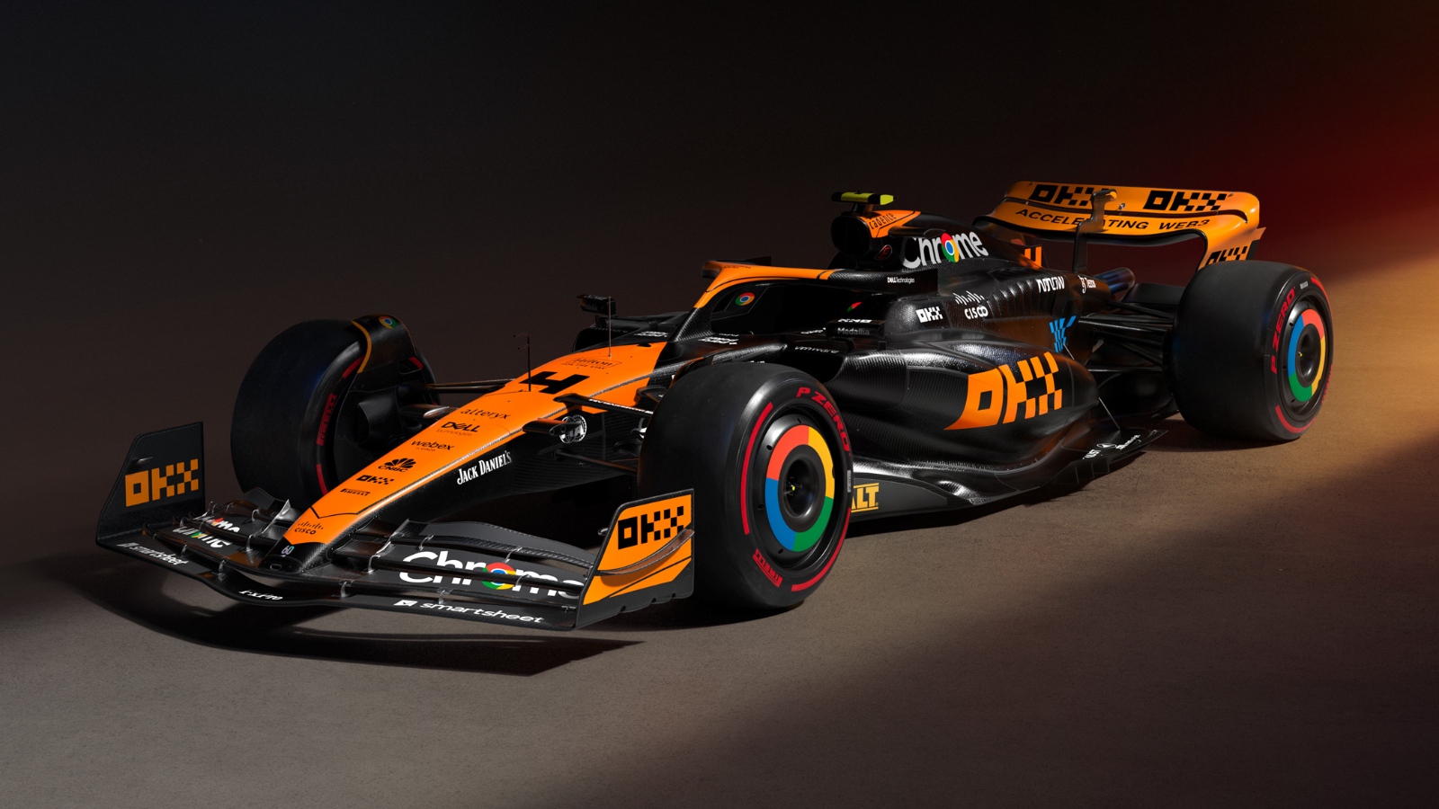 Ingénieurs de McLaren travaillant sur la conception d'un moteur de Formule 1 dans un environnement high-tech.