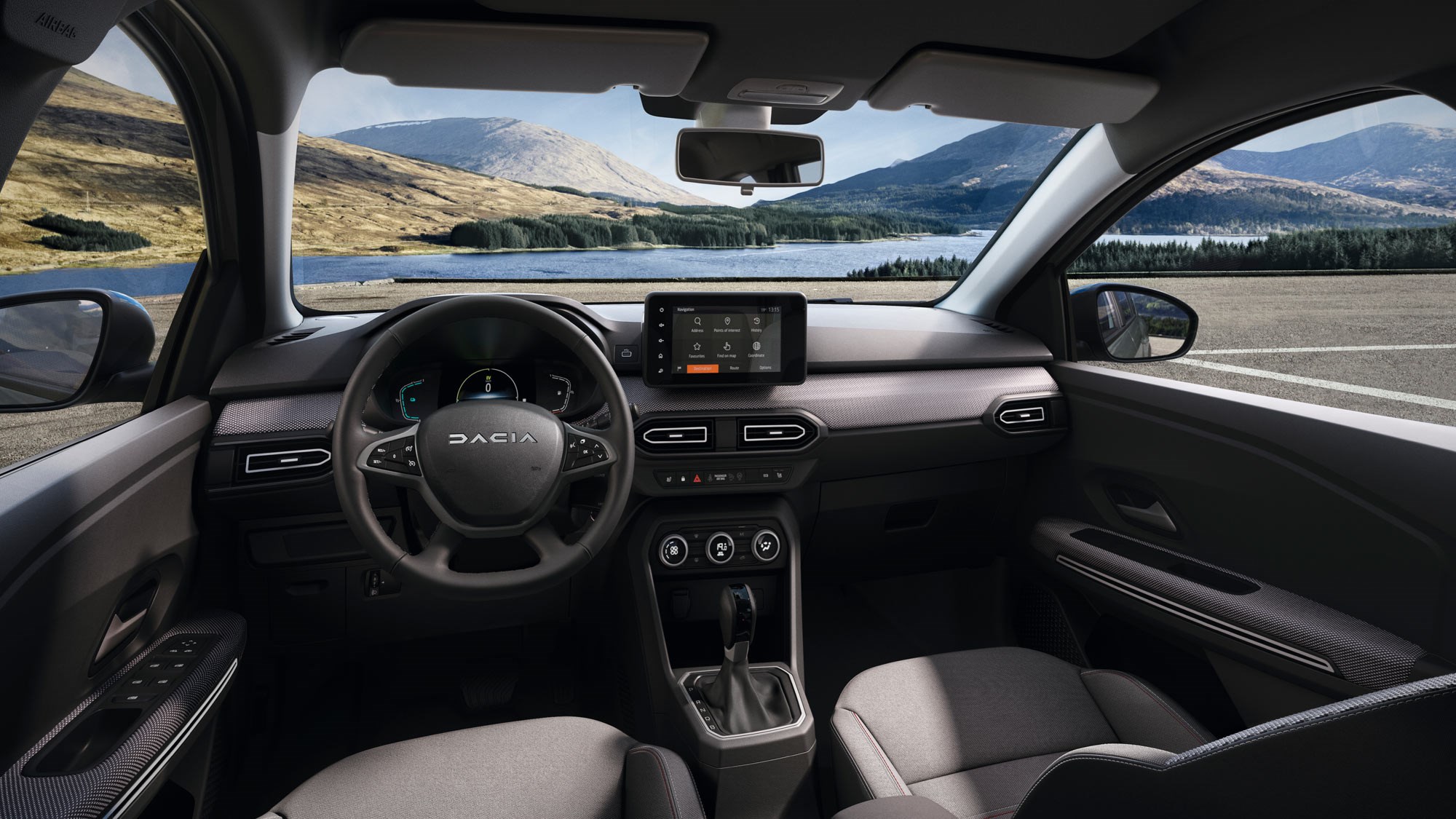 Intérieur de la Dacia Jogger Hybride 2026, montrant les sept sièges configurés pour une famille, avec un espace généreux.