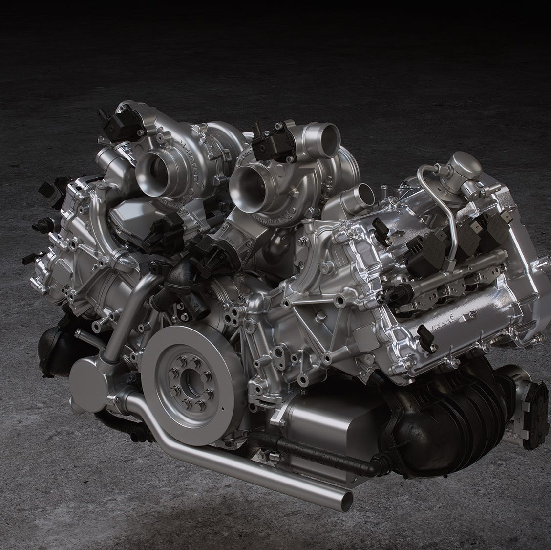 Vue détaillée du moteur V6 hybride d'une McLaren Artura, mettant en évidence sa complexité technique.