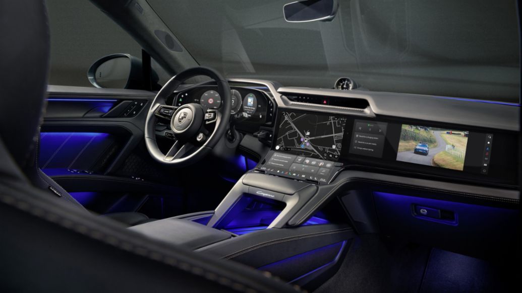 Intérieur du Porsche Cayenne Coupé Electric, montrant le tableau de bord, le volant et les écrans numériques.