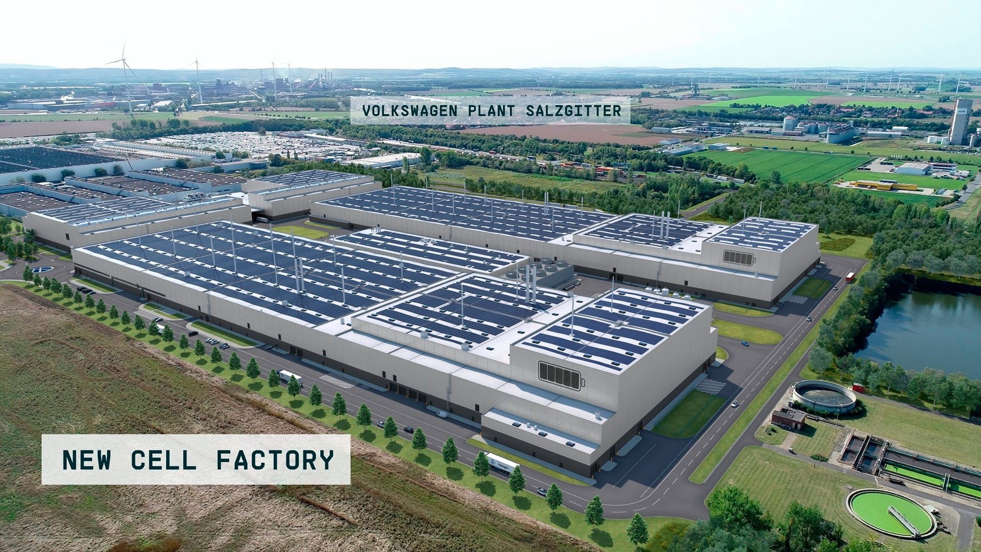Vue aérienne d'un site de construction de giga-usine de batteries en Europe, montrant des travaux inachevés ou abandonnés, avec des grues immobiles et des terrains vagues.