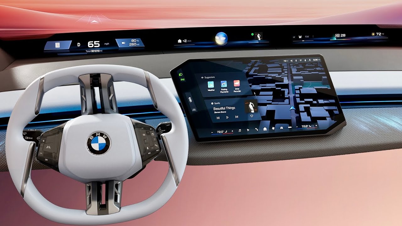 Intérieur d'une BMW i3 2026 avec un grand écran incurvé s'étendant sur le tableau de bord, des sièges en cuir vegan et un volant minimaliste.