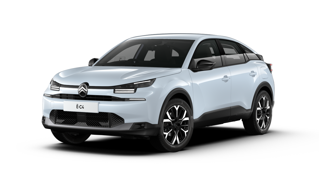 Une Citroën ë-C4 électrique grise garée dans un parking d'entreprise, avec un bâtiment moderne en arrière-plan.