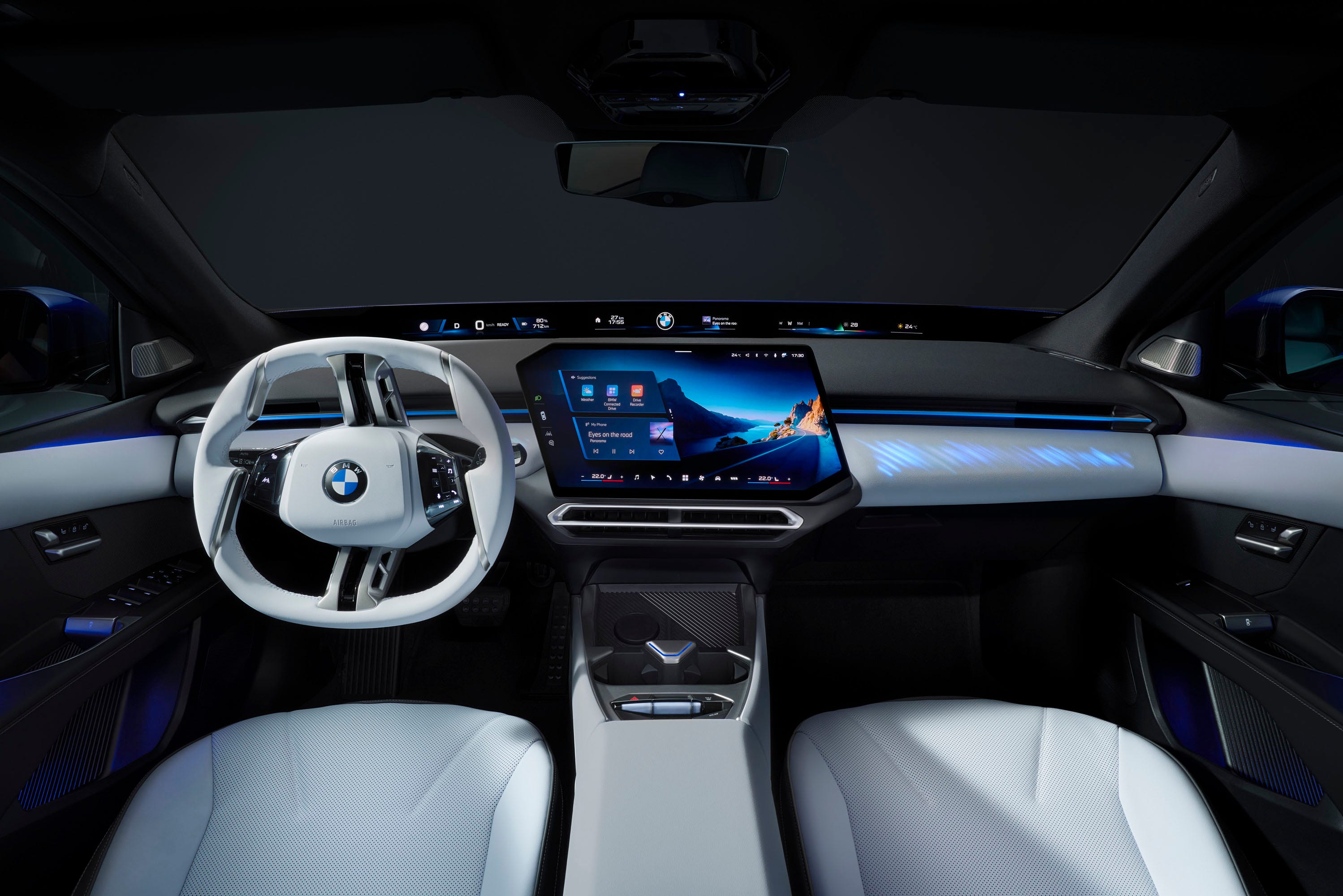 Tableau de bord intérieur de la BMW i3 2027, avec un grand écran iDrive, un éclairage d'ambiance et des matériaux durables.