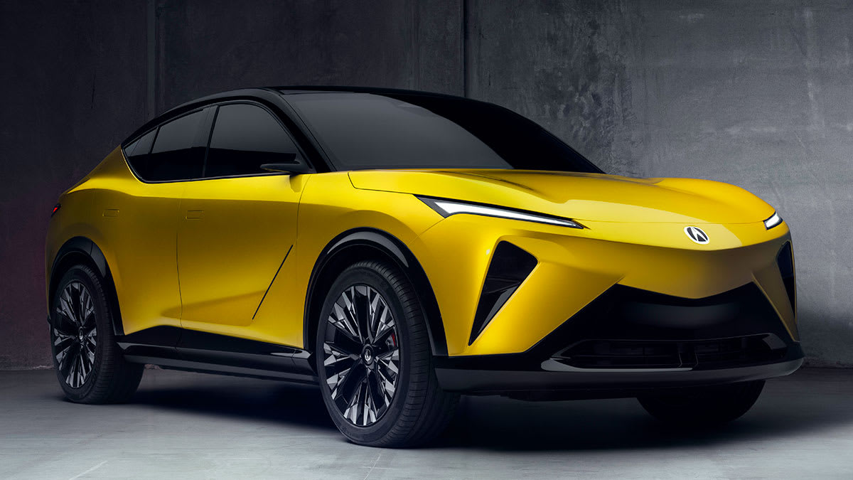 Intérieur futuriste d'un véhicule Acura, avec un grand écran central affichant une interface numérique et des sièges en cuir.