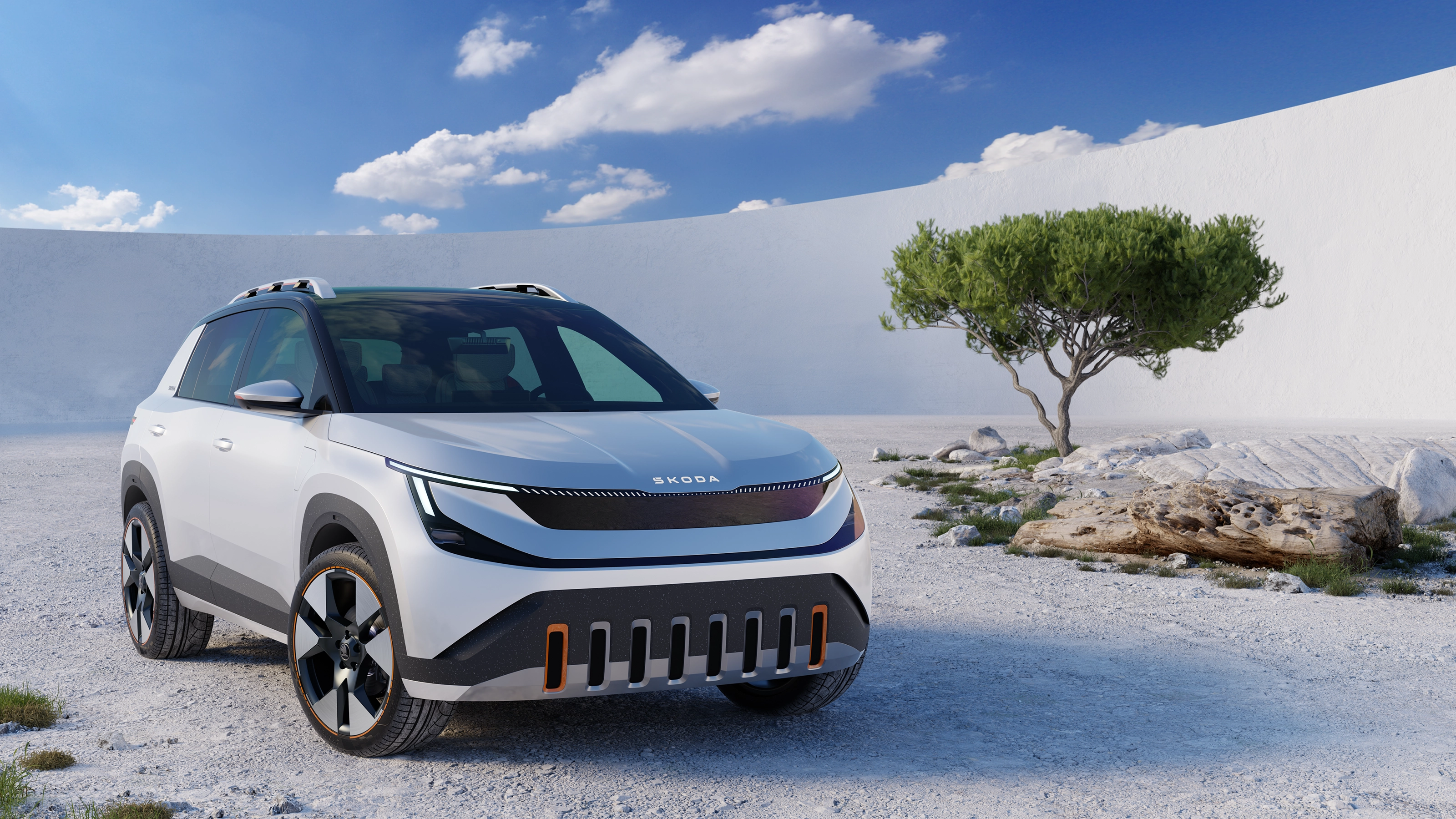 Une image du Skoda Epiq, un SUV électrique compact, garé en ville, mettant en valeur son design extérieur moderne et ses lignes aérodynamiques.