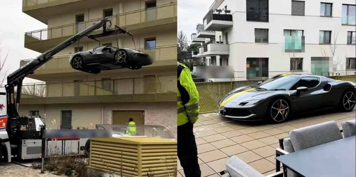 Une Ferrari rouge garée de manière improbable sur le balcon d'un appartement en hauteur, avec une grue visible en arrière-plan.